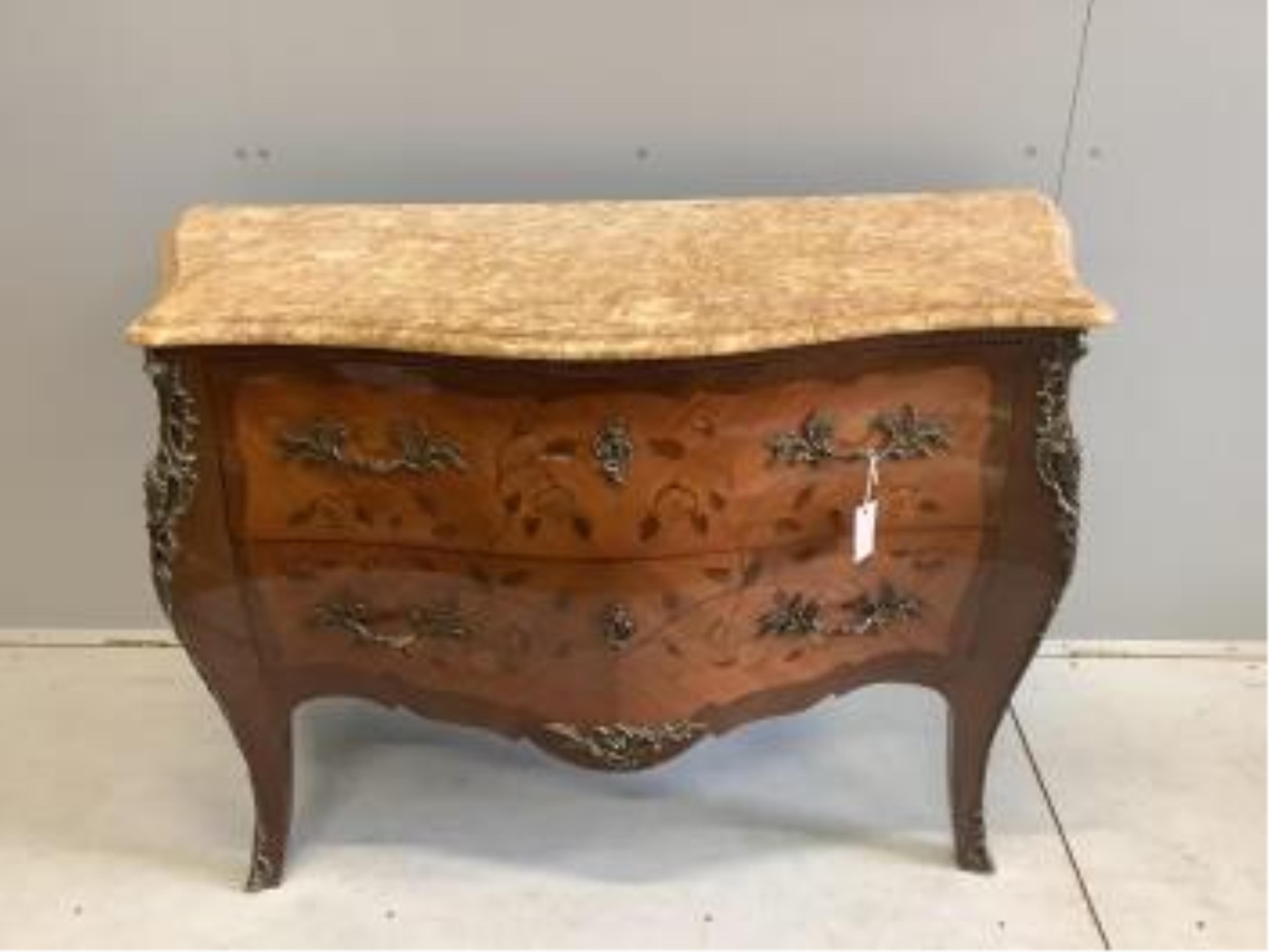 A Louis XVI style marquetry inlaid gilt metal mounted marble topped bombe commode, width 122cm, depth 51cm, height 86cm